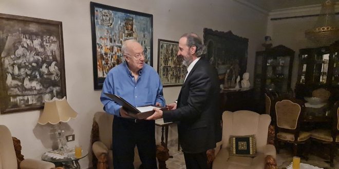 On behalf of President al-Assad and Mrs. Asma, Minister Azzam visits great historian Mohammad Qajah in Aleppo